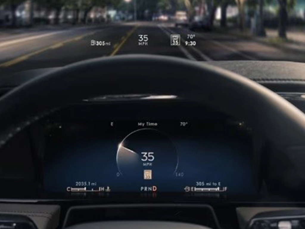Driver's view of digital car dashboard displaying speed.