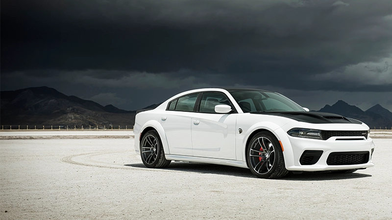 the dodge charger srt hellcat red eye in white parked in desert in right hand drive by autogroup