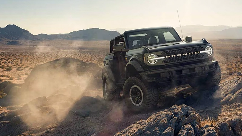 the ford bronco badlands speeding through desert environment converted to right hand drive by autogroup international