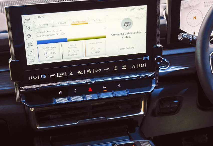 a gmc hummer ev suv edition one converted to right hand drive by autogroup international dash close up infotainment screen