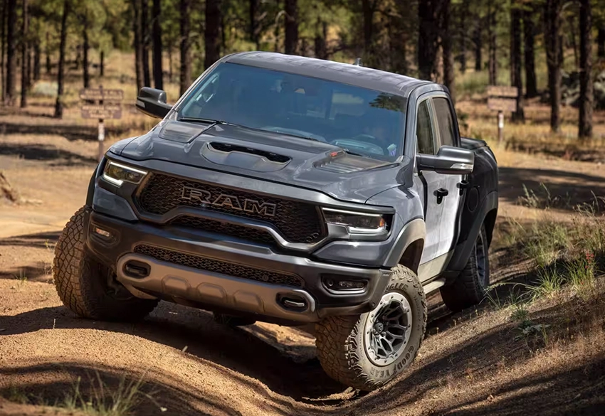 Ram 1500 TRX front on driving through ditch which shows rough terrain capability