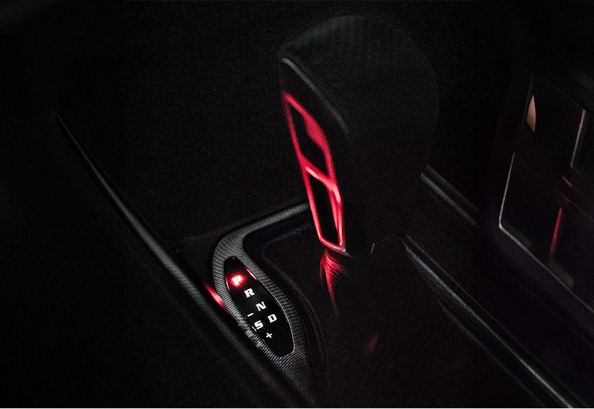 Ram 1500trx gear stick closeup with carbon fibre inserts