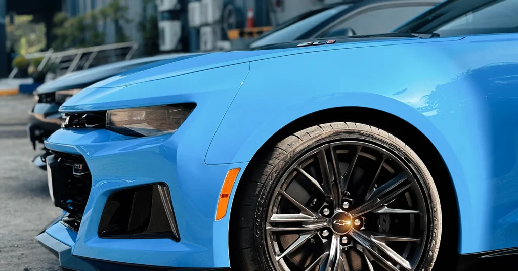 Front of Chevrolet Camaro Zl1 in Rapid blue converted to right hand drive by autogroup