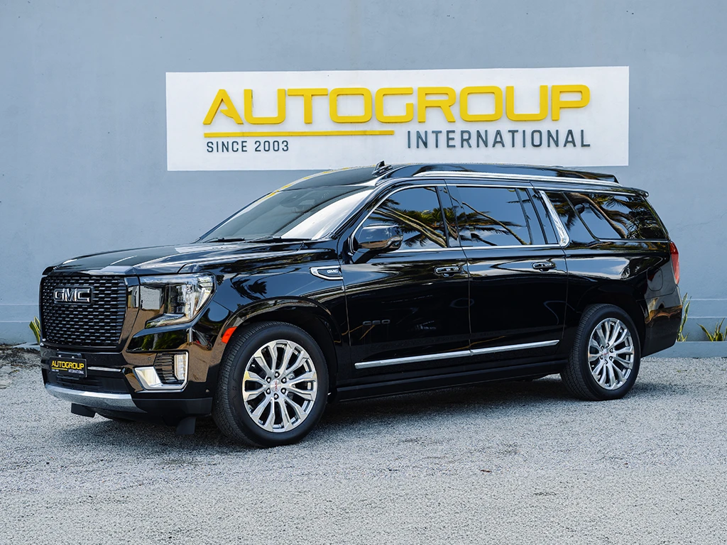 Black GMC SUV outside Autogroup International dealership