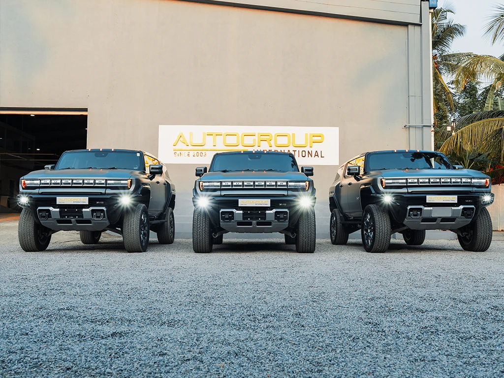 three autogroup international right hand drive converted hummer ev pictured in line at factory