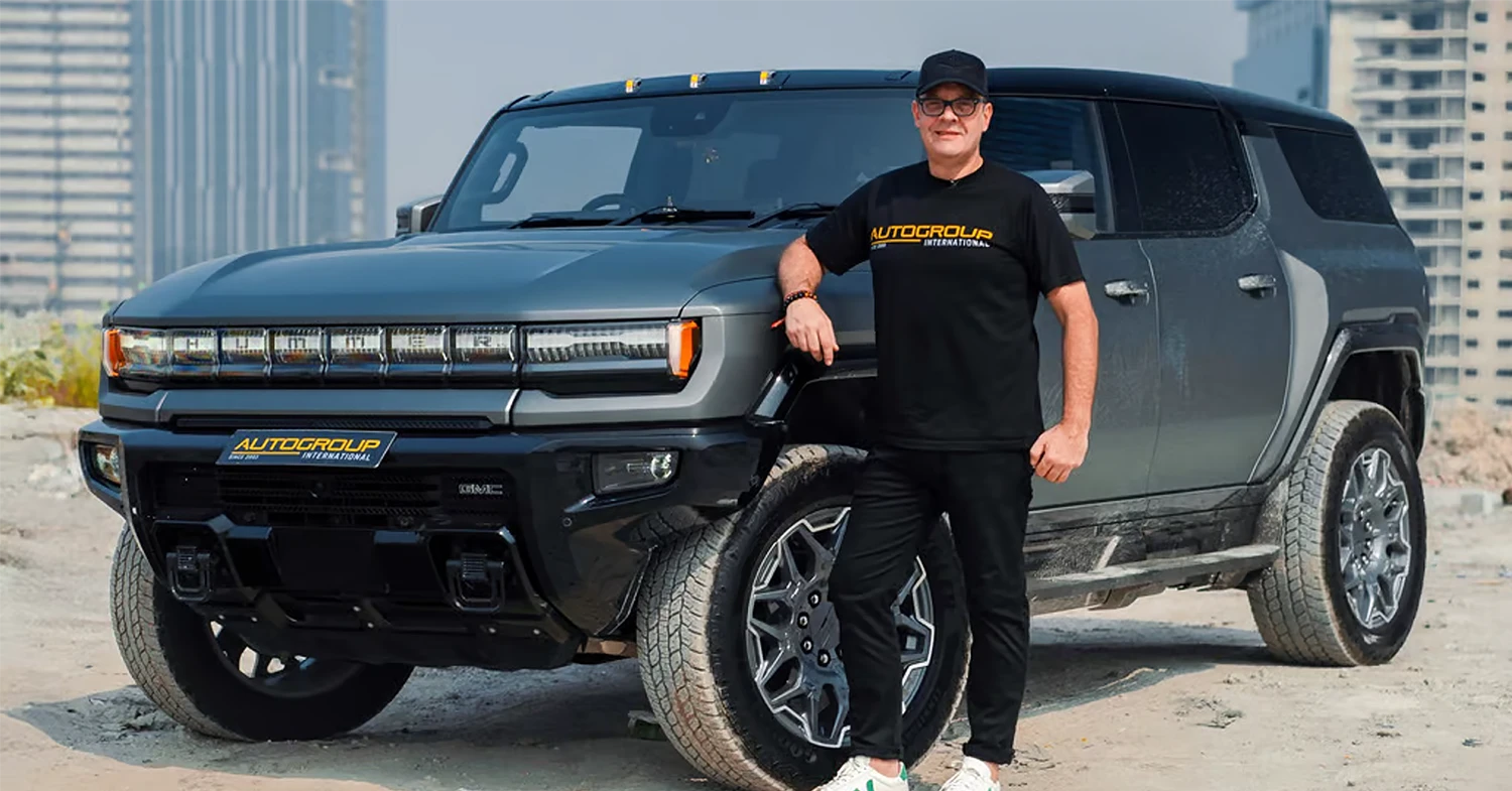 Rob Hill CEO of Autogroup International standing next to first Hummer EV in India