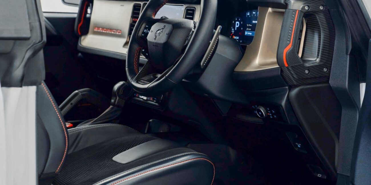 The right-hand drive steering wheel of the 2025 Ford Bronco Raptor SUV in right-hand drive at Autogroup International