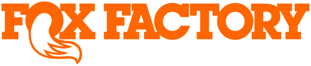 Fox Factory logo in bold orange letters