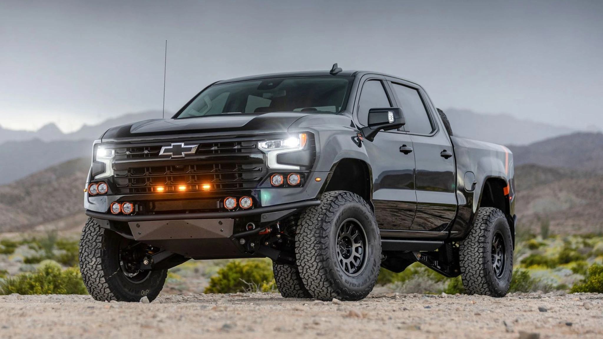 Fox Factory Black Chevrolet Silverado 1500 off-road truck in desert
