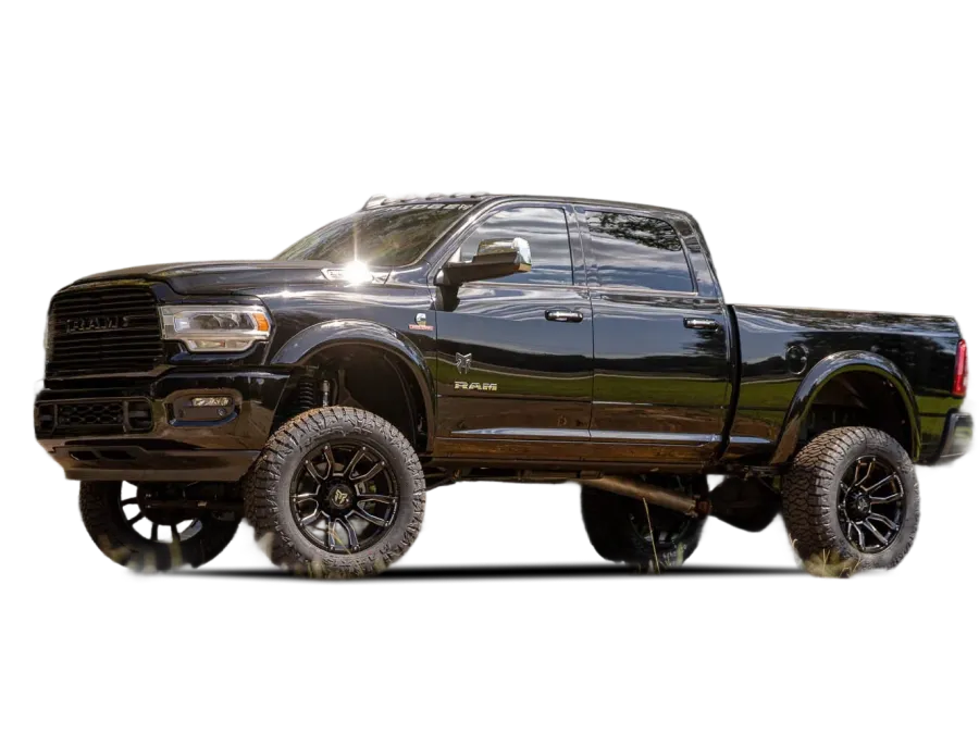 Black lifted Ram truck with off-road tires