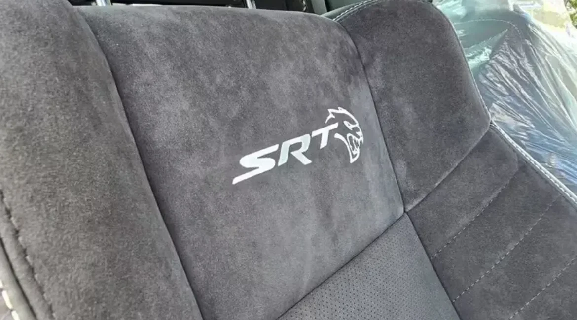 Black suede car seat with SRT logo