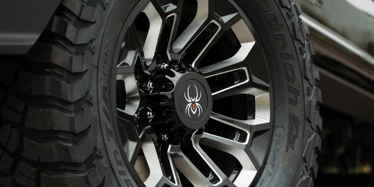 Close-up rugged off-road truck tire and alloy wheel