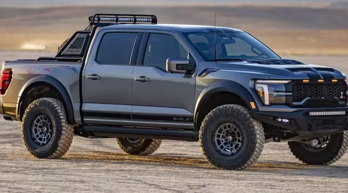 Gray off-road pickup truck in desert landscape