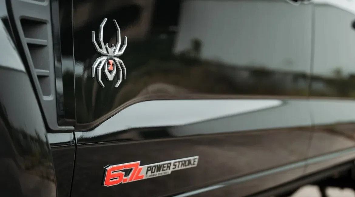 Black truck with spider emblem and 6.7L badge