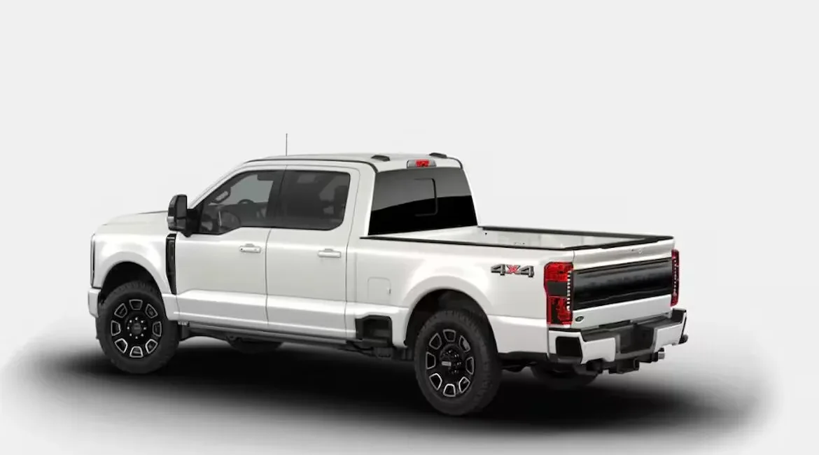 White 4x4 pickup truck side rear view
