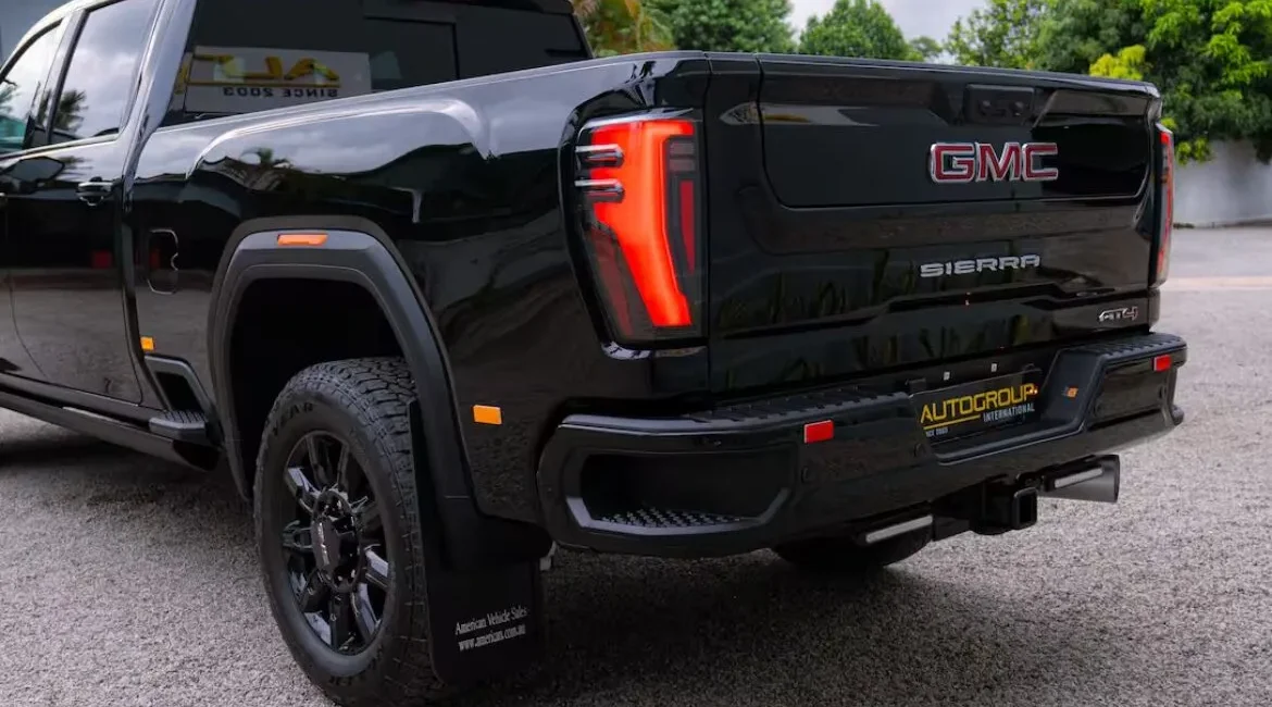 Black GMC Sierra pickup truck rear view