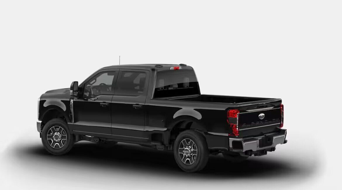 Black full-size pickup truck on white background