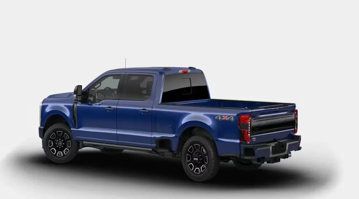 Blue 4x4 pickup truck side rear view