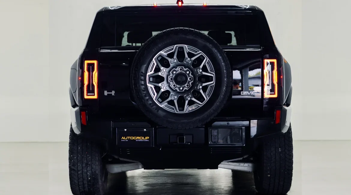 Rear view of black GMC Hummer SUV