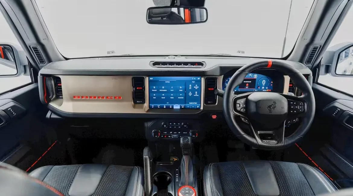 Modern SUV interior with digital dashboard and steering wheel