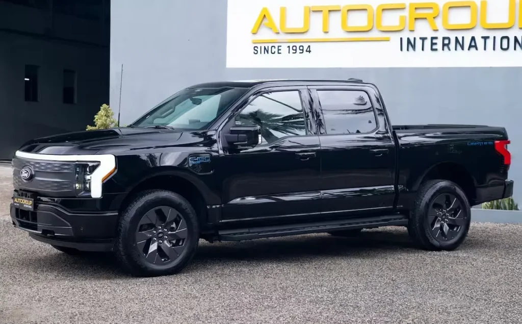 Black Ford F-150 pickup truck outdoors