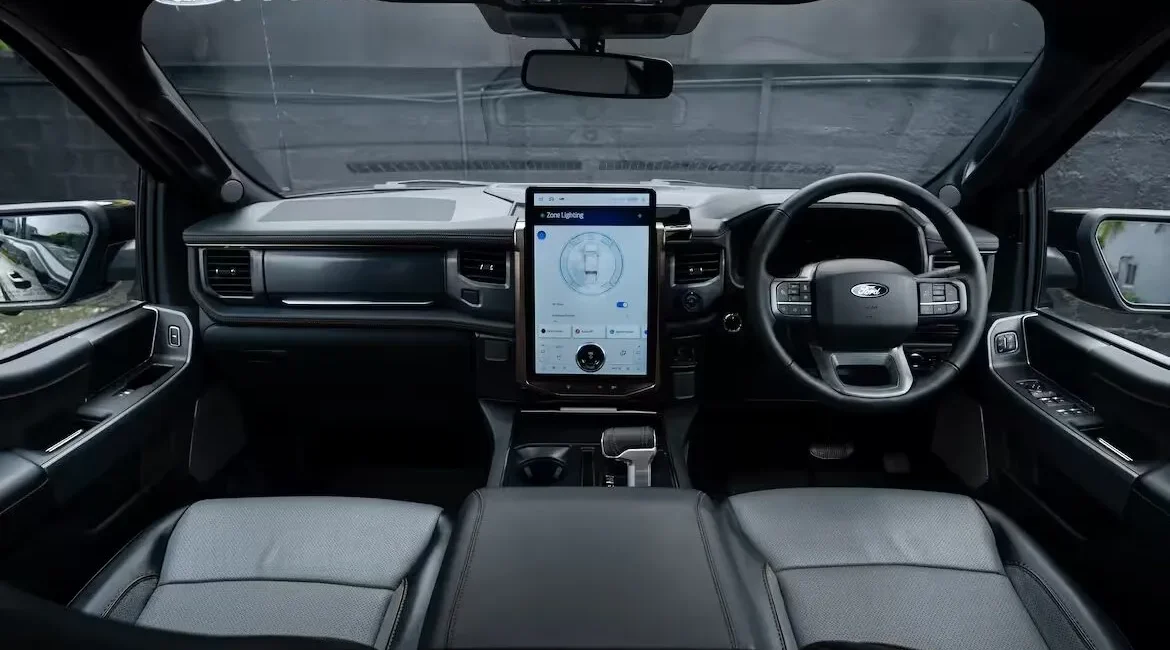 Modern truck interior with touchscreen display and steering wheel