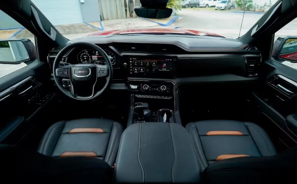 Modern GMC truck interior with dashboard and steering wheel