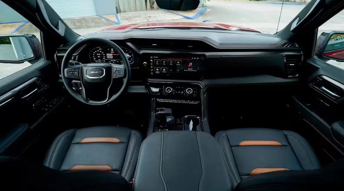 Modern GMC truck interior with dashboard and steering wheel