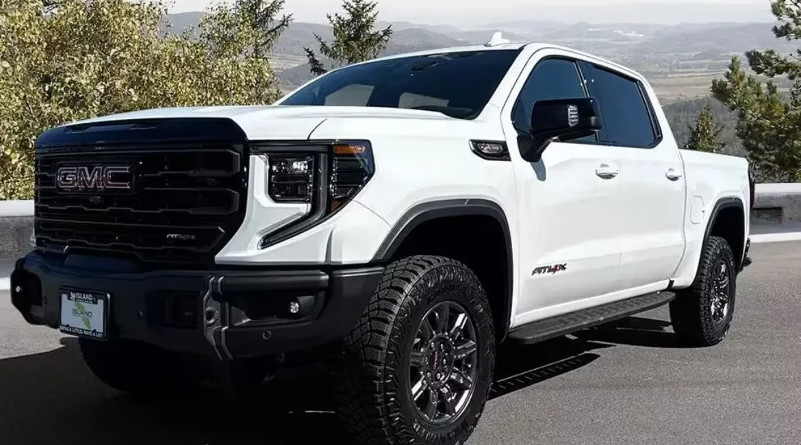 White GMC pickup truck parked outdoors