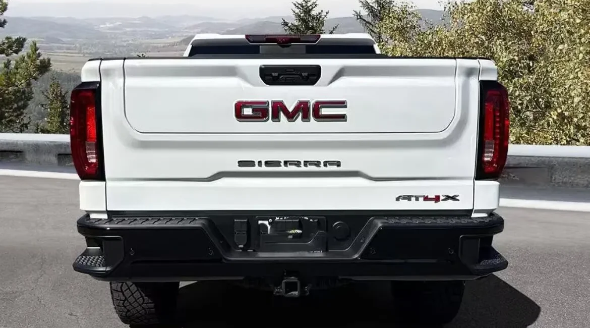 Rear view of white GMC Sierra truck