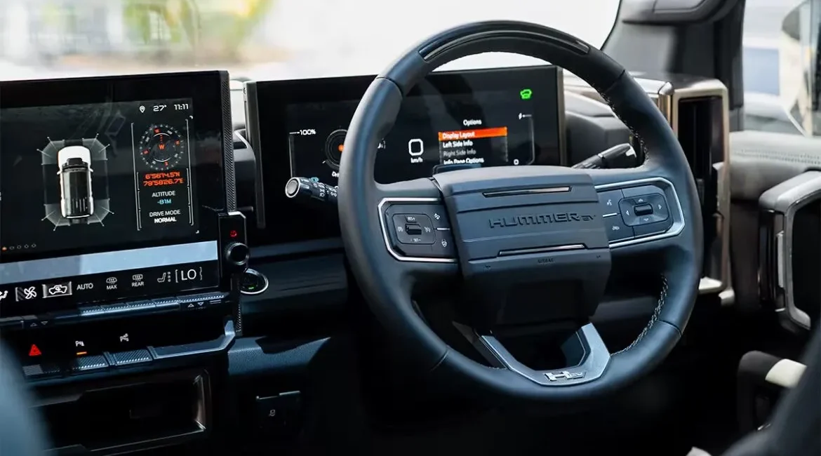 Hummer EV interior with digital dashboard and steering wheel