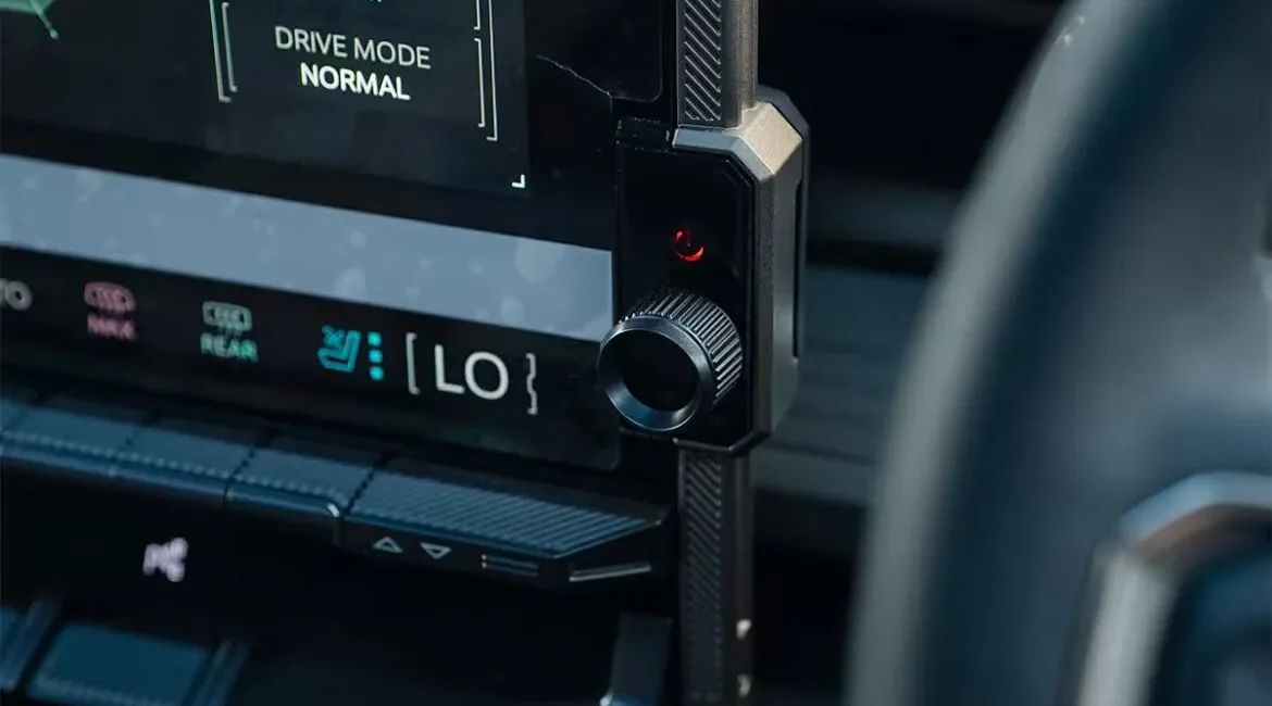 Car touchscreen showing drive mode and controls