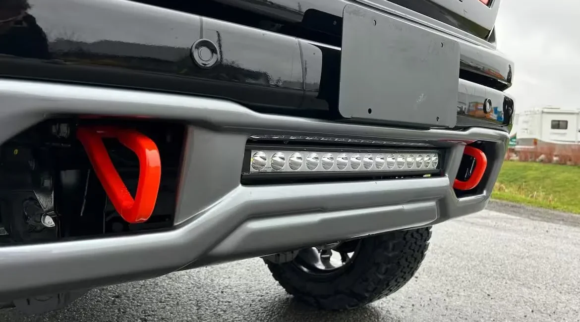 Truck bumper with LED light bar and hooks