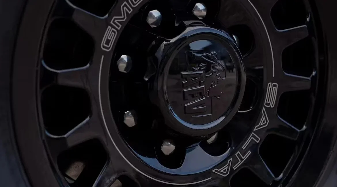 Close-up of black GMC wheel rim