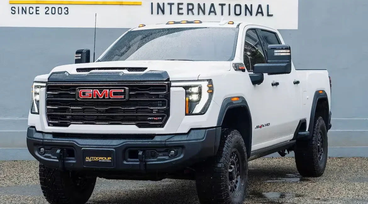 White GMC Sierra HD truck parked outdoors