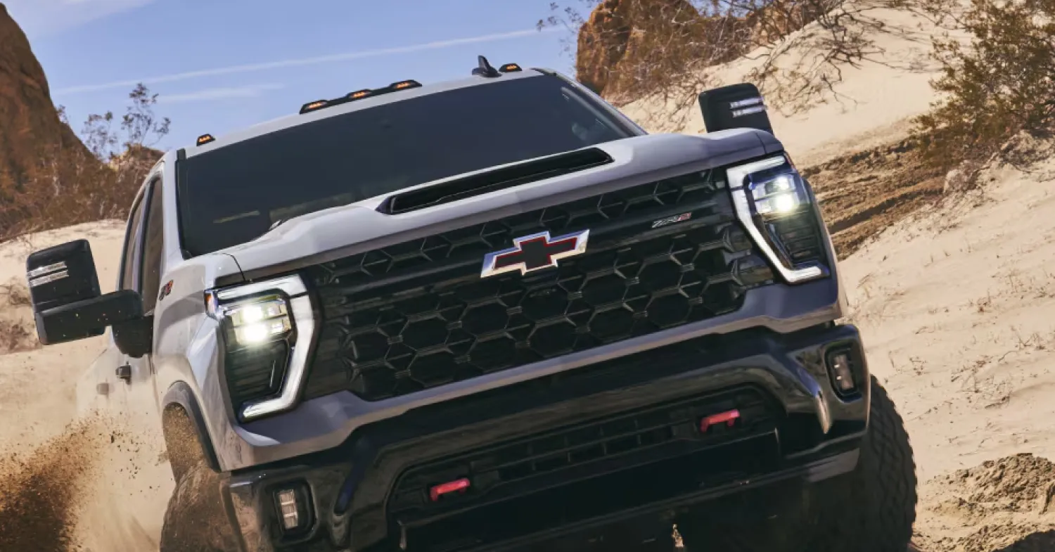 Chevrolet truck driving off-road in desert terrain