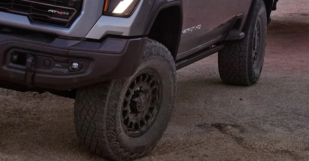 Off-road truck tires on dirt terrain