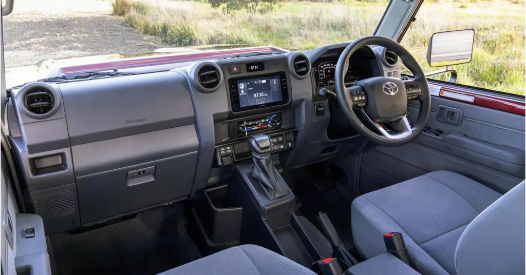 Right-hand-drive Toyota SUV interior with manual transmission