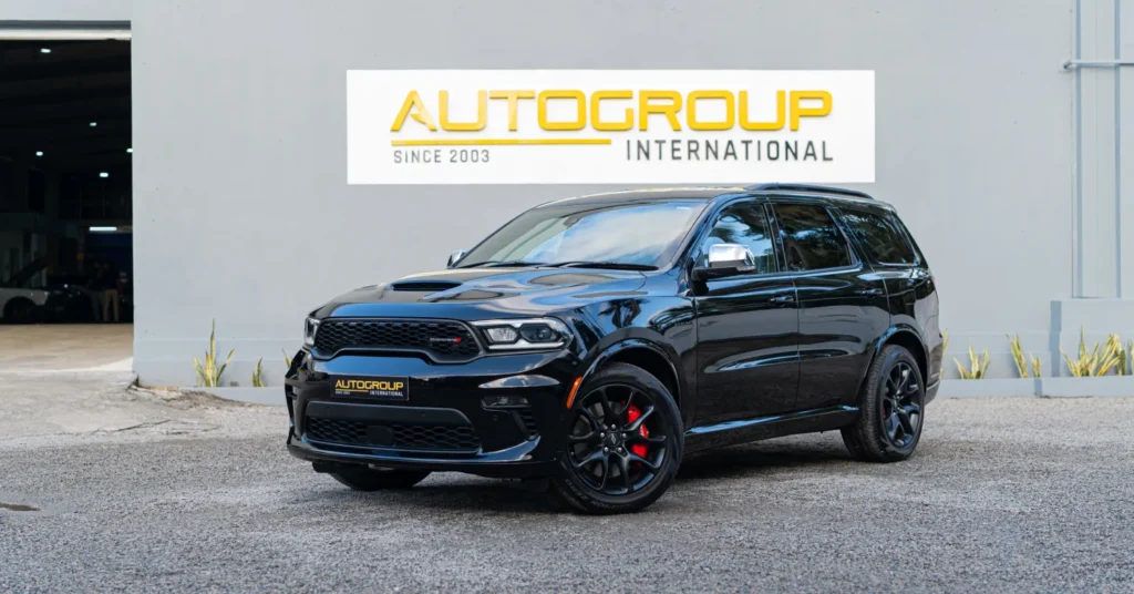 Black Dodge Durango parked outside dealership
