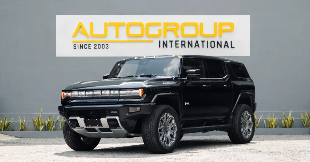 Black GMC Hummer EV SUV outside dealership